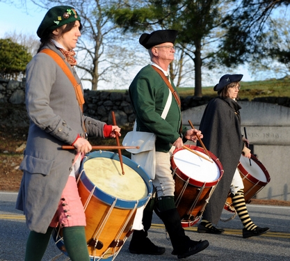 The Sudbury Ancient Fyfe and Drum Companie marches from Sudbury Town Hall to Concord