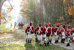 British Redcoats encounter colonial soldiers during Battle of Red Horse Tavern at Wayside Inn
